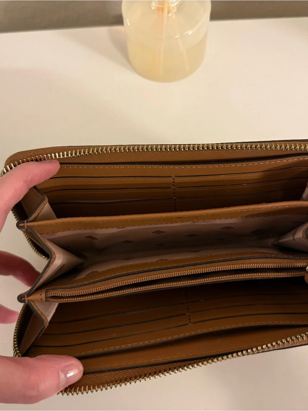 kate spade Brown Zip-Around Pebbled Leather Wallet